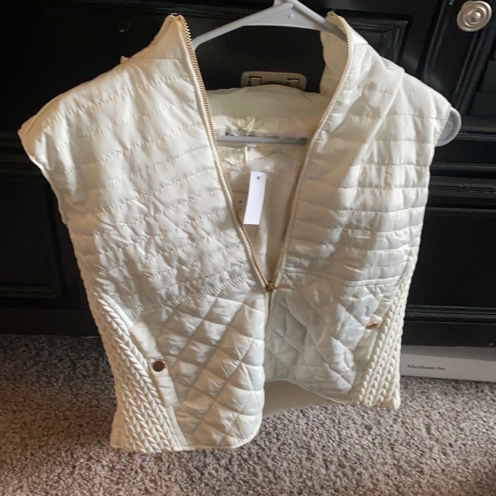 h.q white fuzzy vest